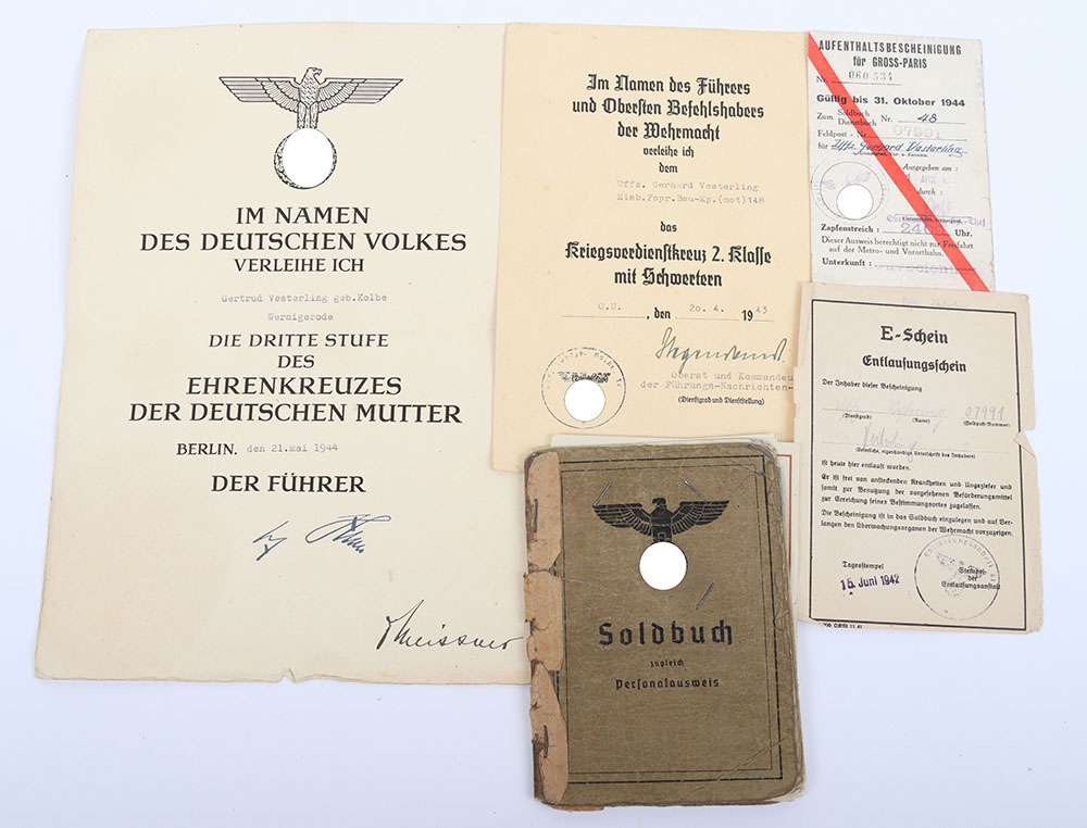 #1077 – WW2 German Soldbuch and Award Citation of Unteroffizier Gerhard Vesterling Heavy Railway Wire Company 148