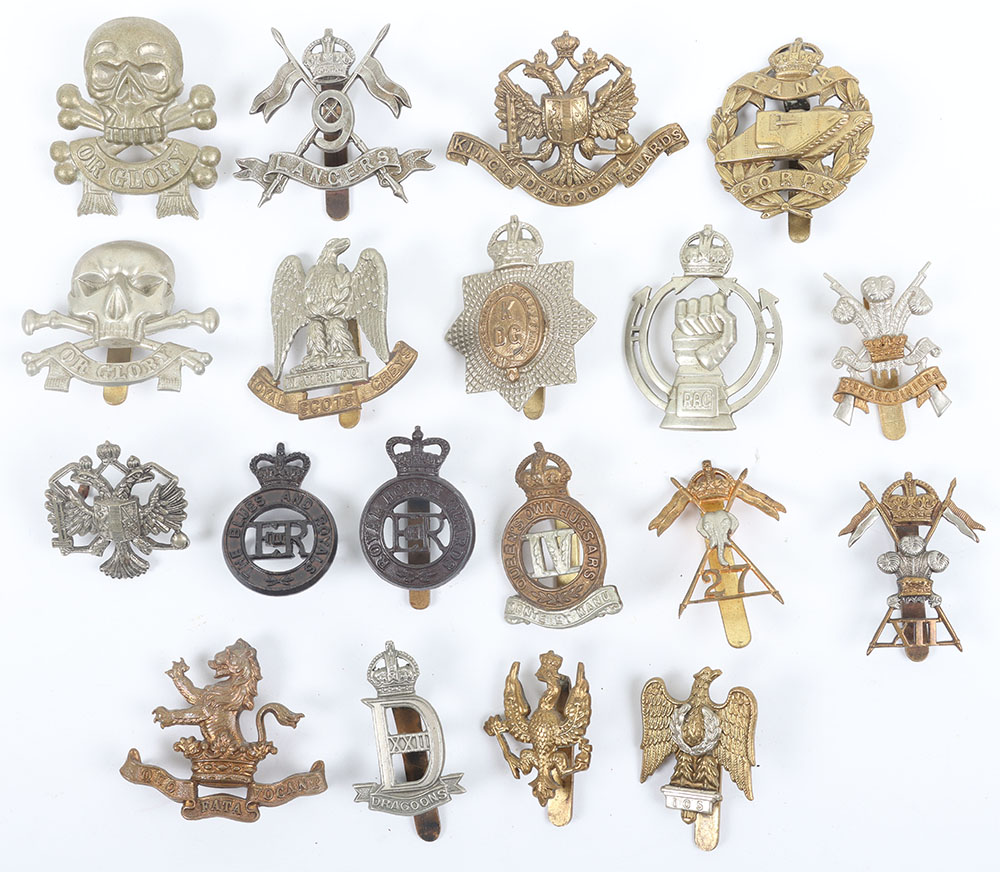 #1235 – 19x British Cavalry Cap Badges