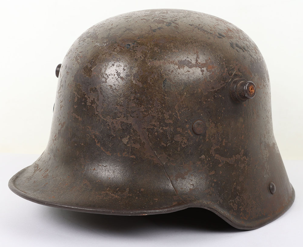 #784 – WW1 German M-16 Battle Damaged Steel Combat Helmet