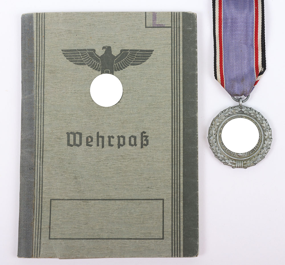 #1119 – WW2 German Wherpass with Entry for the Luftschutz Decoration