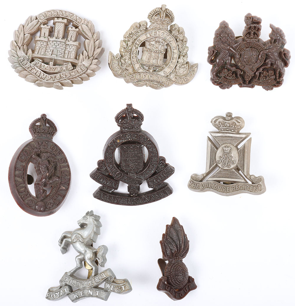 #214 – 8x WW2 British War Economy Plastic Cap Badges