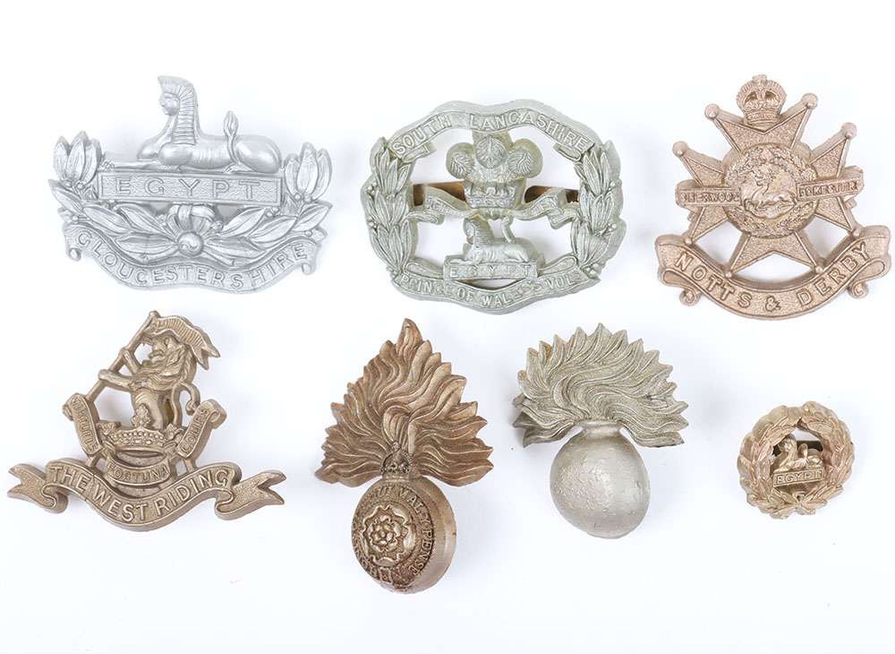 #217 – 7x WW2 British War Economy Plastic Cap Badges