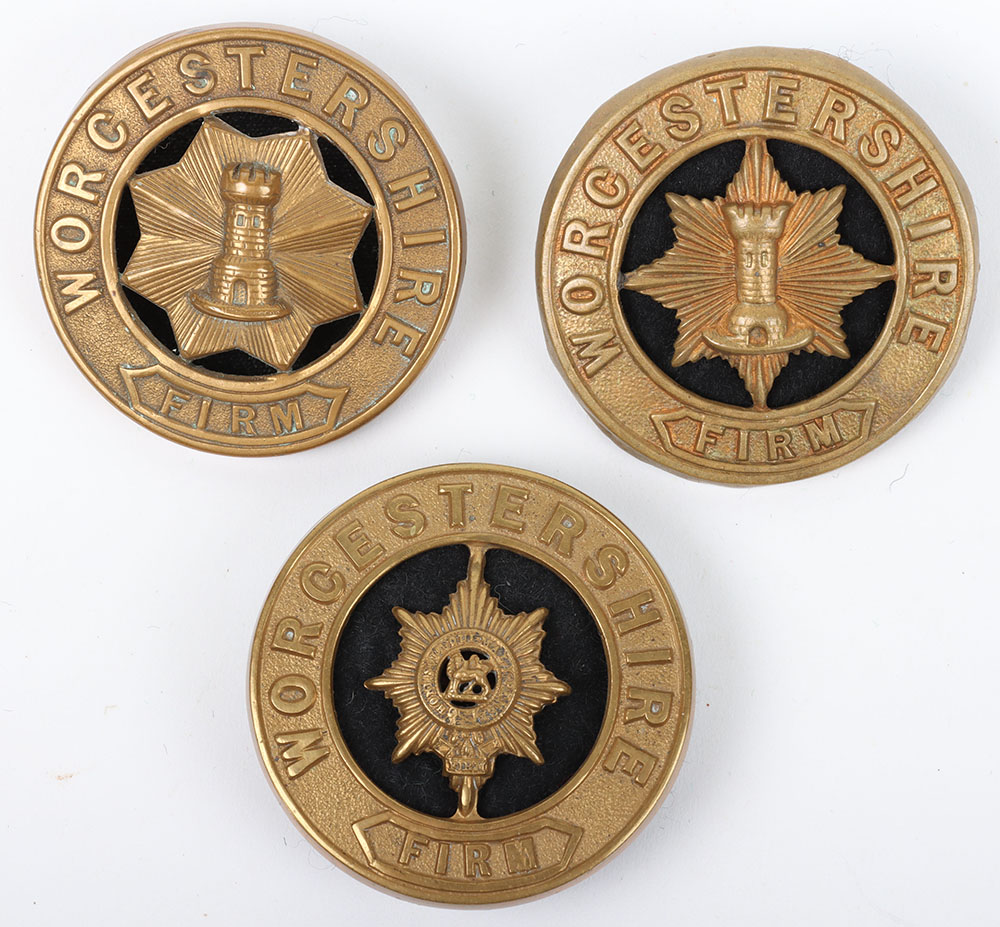 #228 – Three Patterns of Worcestershire Regiment Other Ranks Helmet Plate Centres