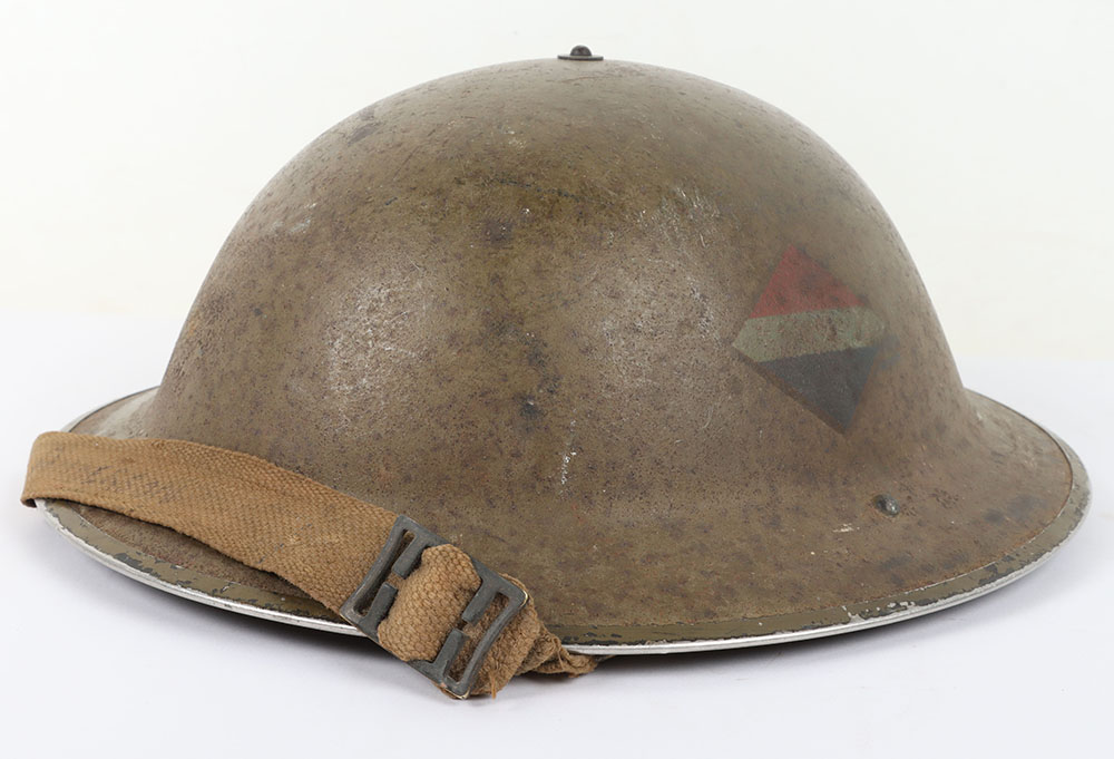 #699 – WW2 British Steel Combat Helmet with Regimental Emblem