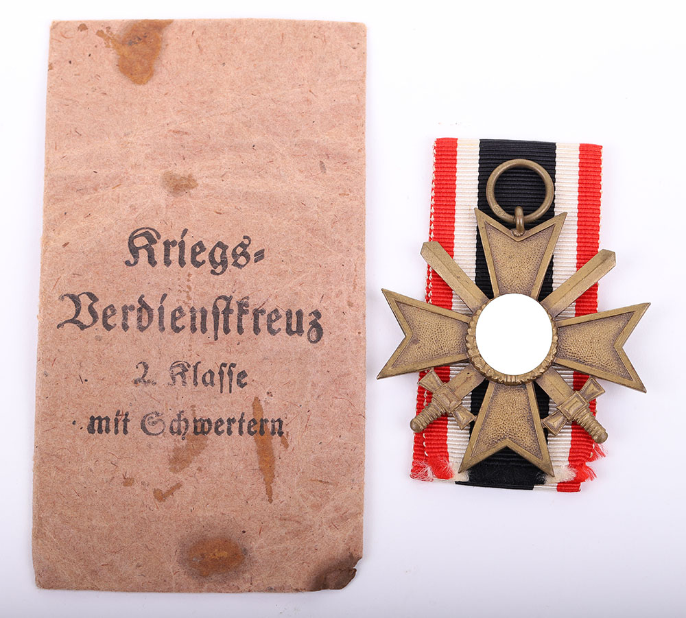 #102 – GERMAN WWII WAR MERIT CROSS W/ SWORDS W/ ISSUE PACKET