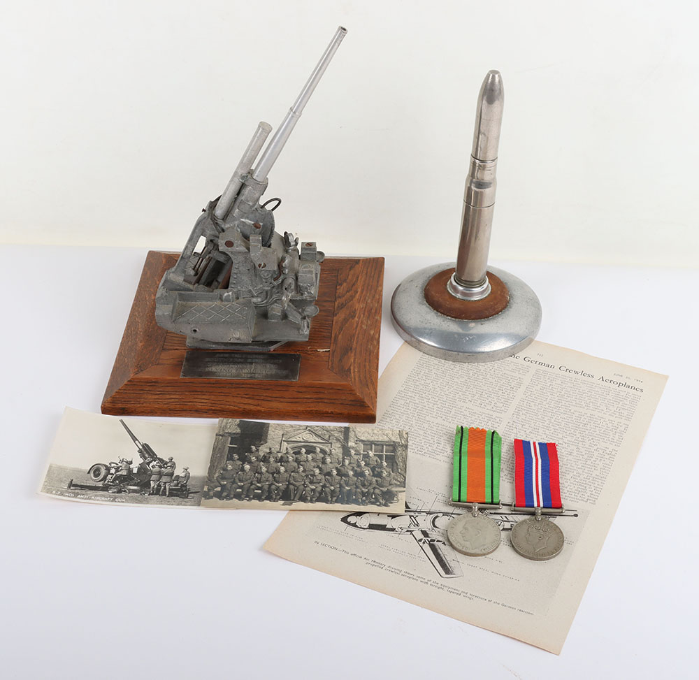 #244 – Presentation Trophy of a Anti-Aircraft Gun and Medals Relating to Sergeant Smith ‘The Flying Bomb Victor’