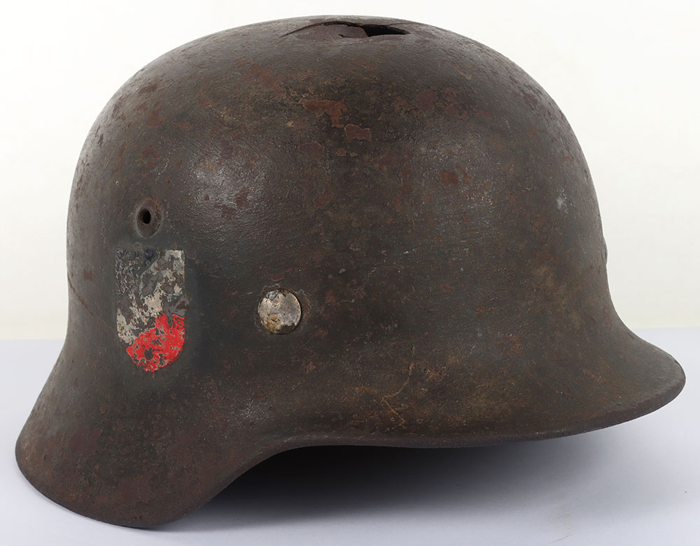 #517 – WW2 German Army M-35 Double Decal Battle Damaged Steel Combat Helmet Attributed to Leutnant Becker