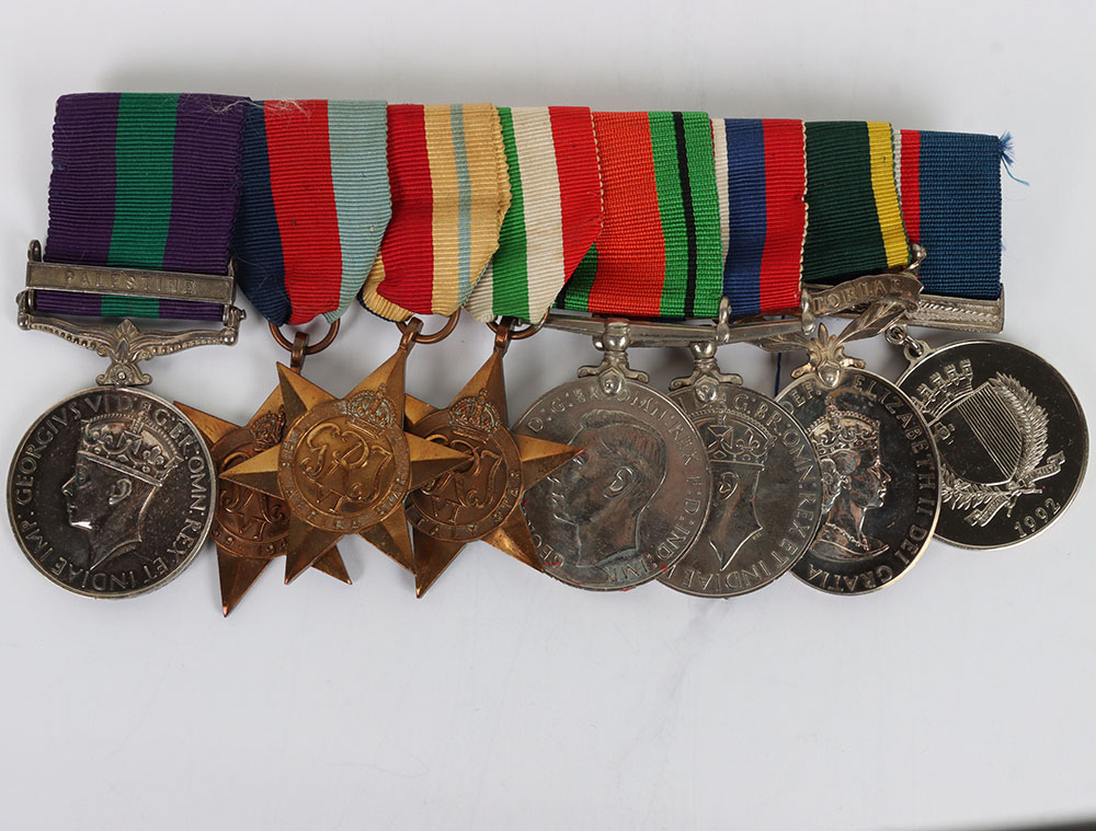 #53 – A Pre-War Palestine Territorial Long Service Medal Group of Eight to a Soldier in the Royal West Kent Regiment Who Was Wounded During the Second World War