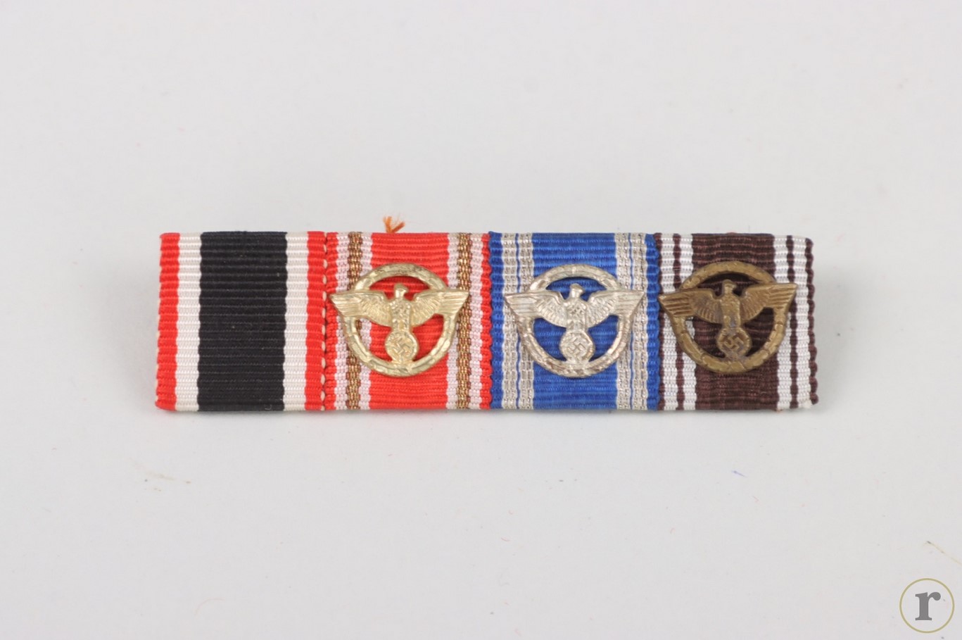 #73-0265 – 4-place ribbon bar with NSDAP Long Service Award in Gold