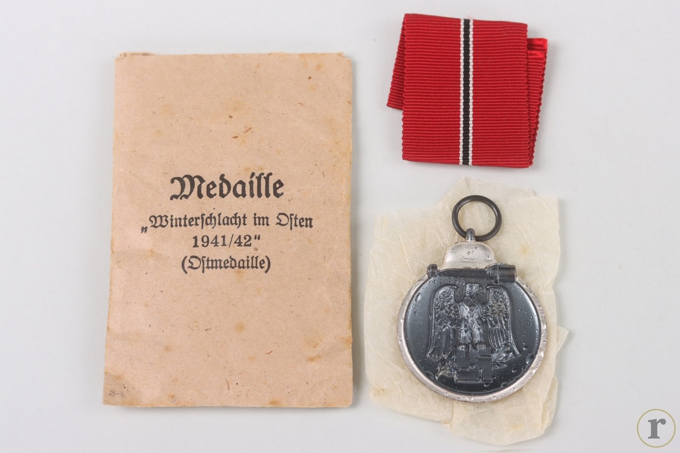 #73-1435 – East Medal with bag