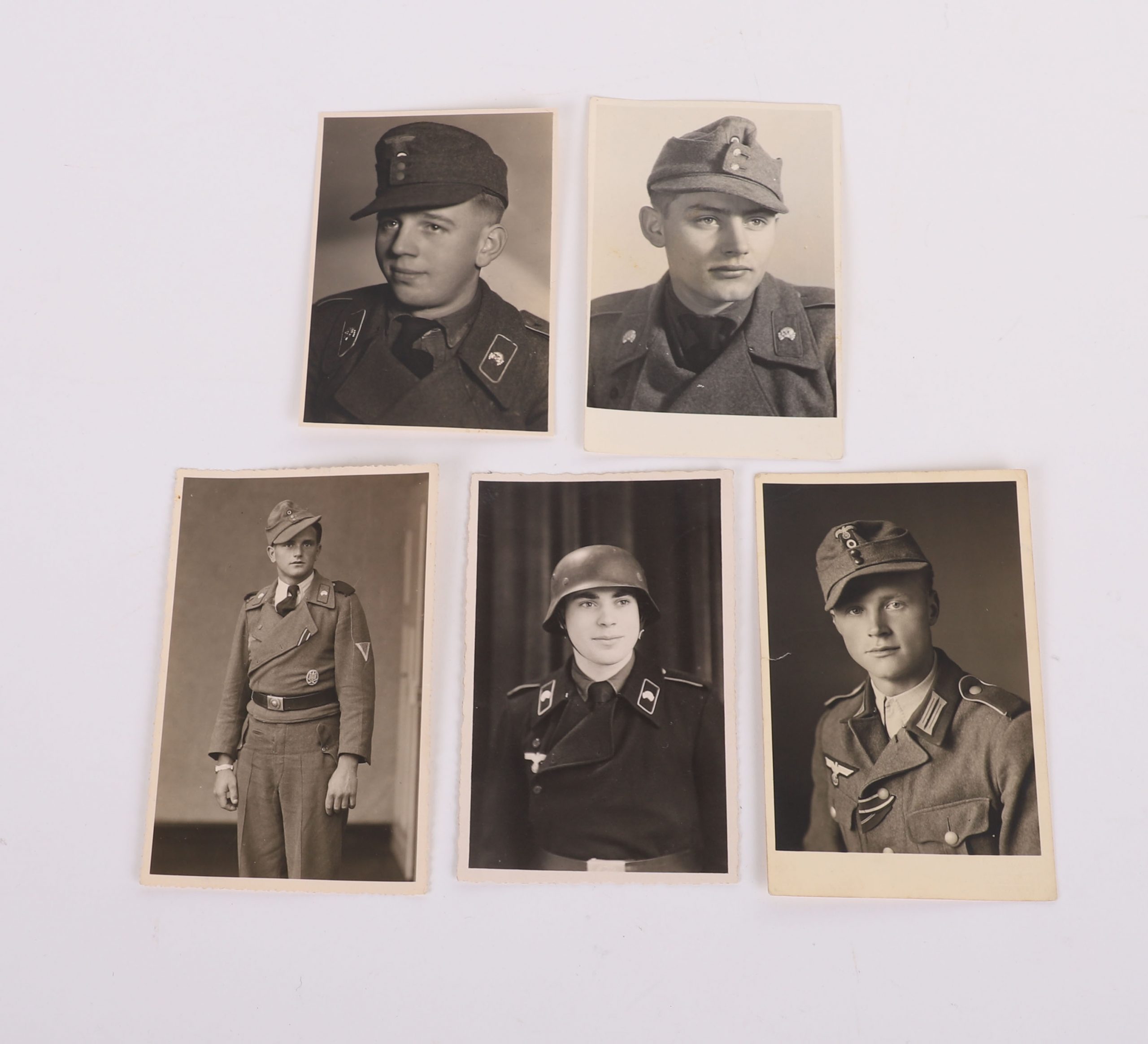 #128 – 1 HEER PHOTO 3 ¼’ X 4 ¾’ OF MAN WEARING FIELD-GRAY WRAPPER & M-43 CAP