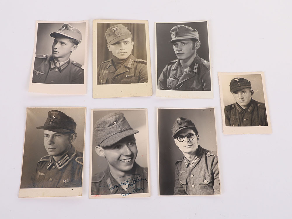 #131 – 4 HEER PHOTO POSTCARDS OF MEN IN COMBAT TUNICS & M-43’s