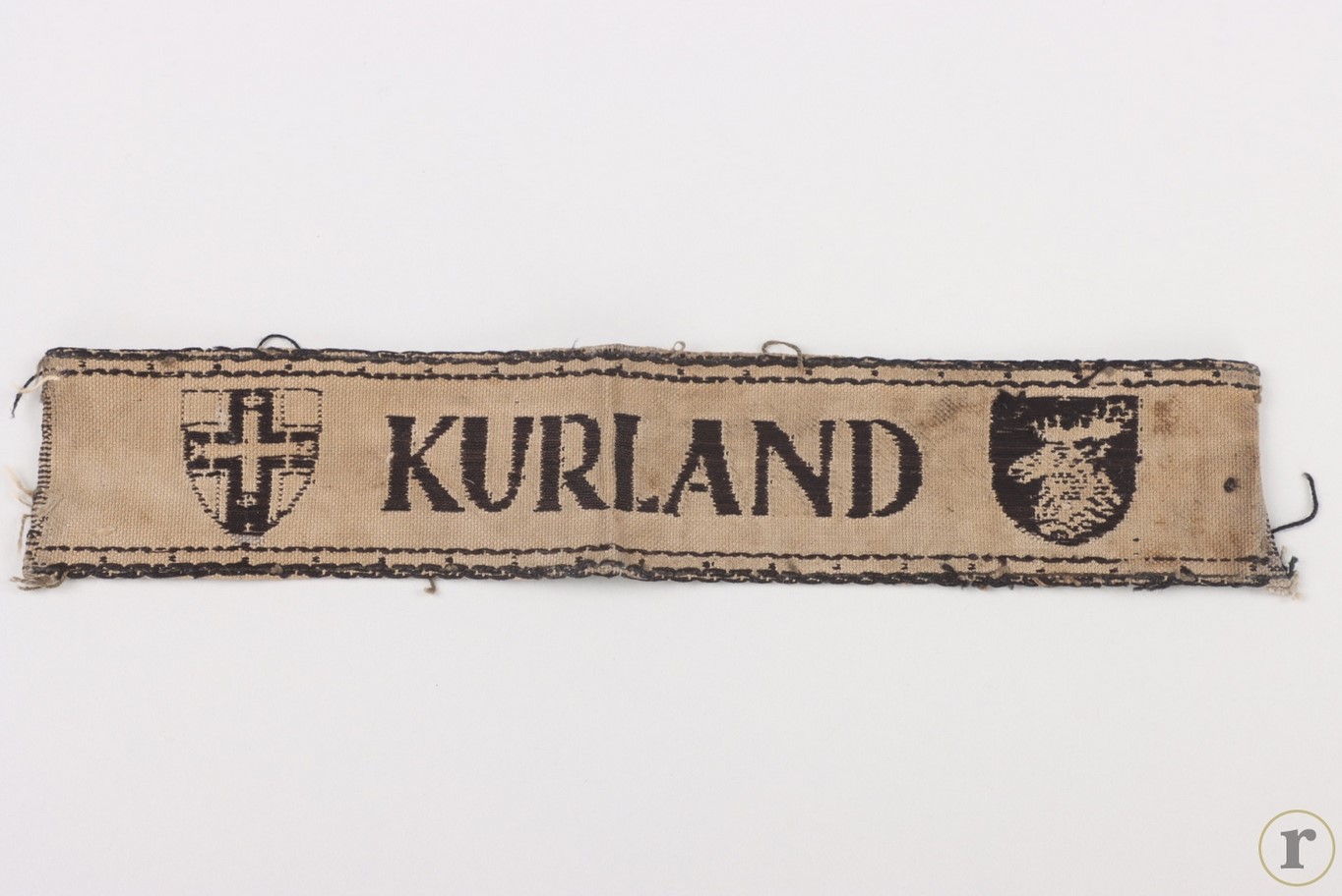 #75-1636 – Wehrmacht cuff title ‘KURLAND’