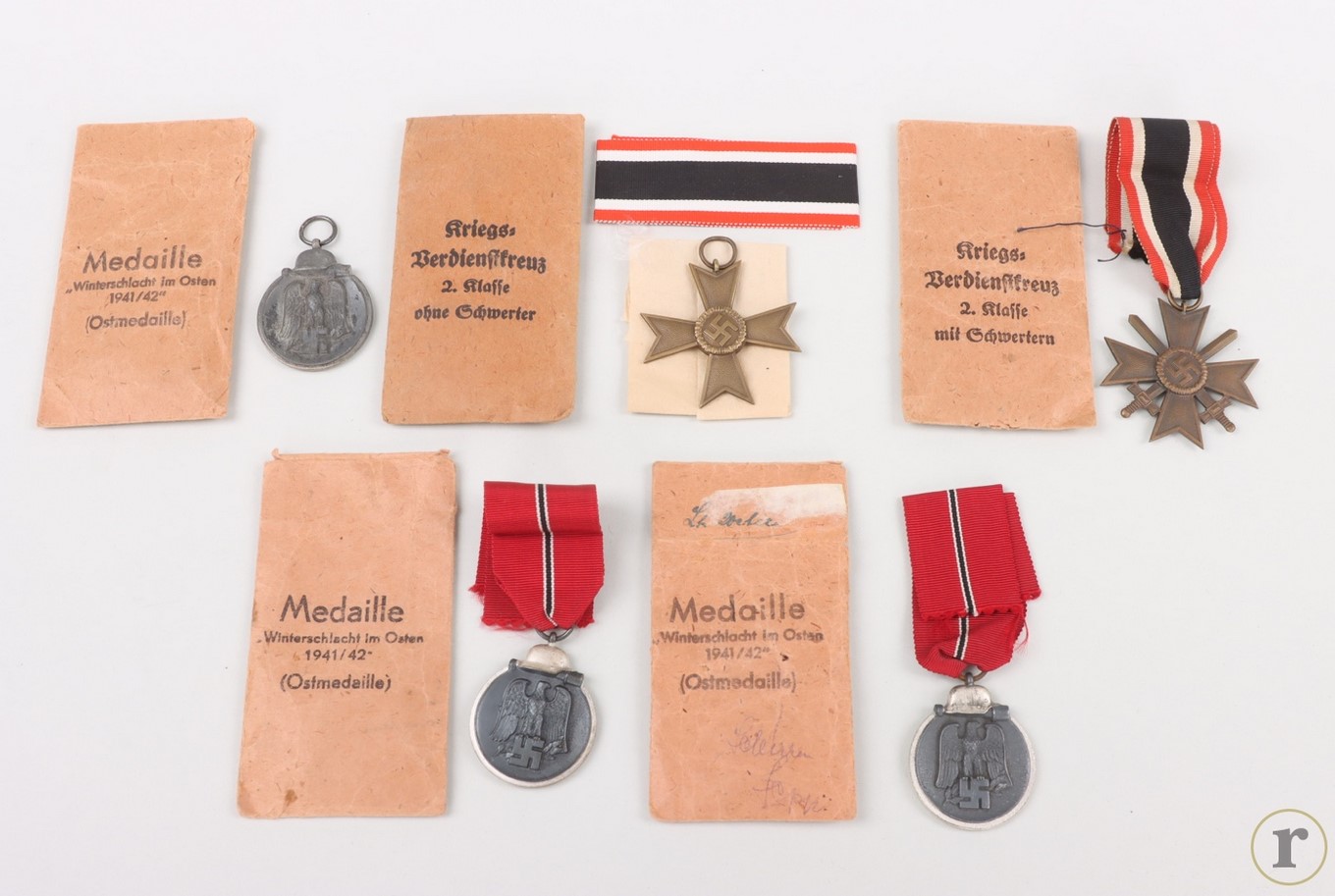 #75-1659 – Lot of East Medals and 1939 War Merit Crosses 2nd Class + bags of issue