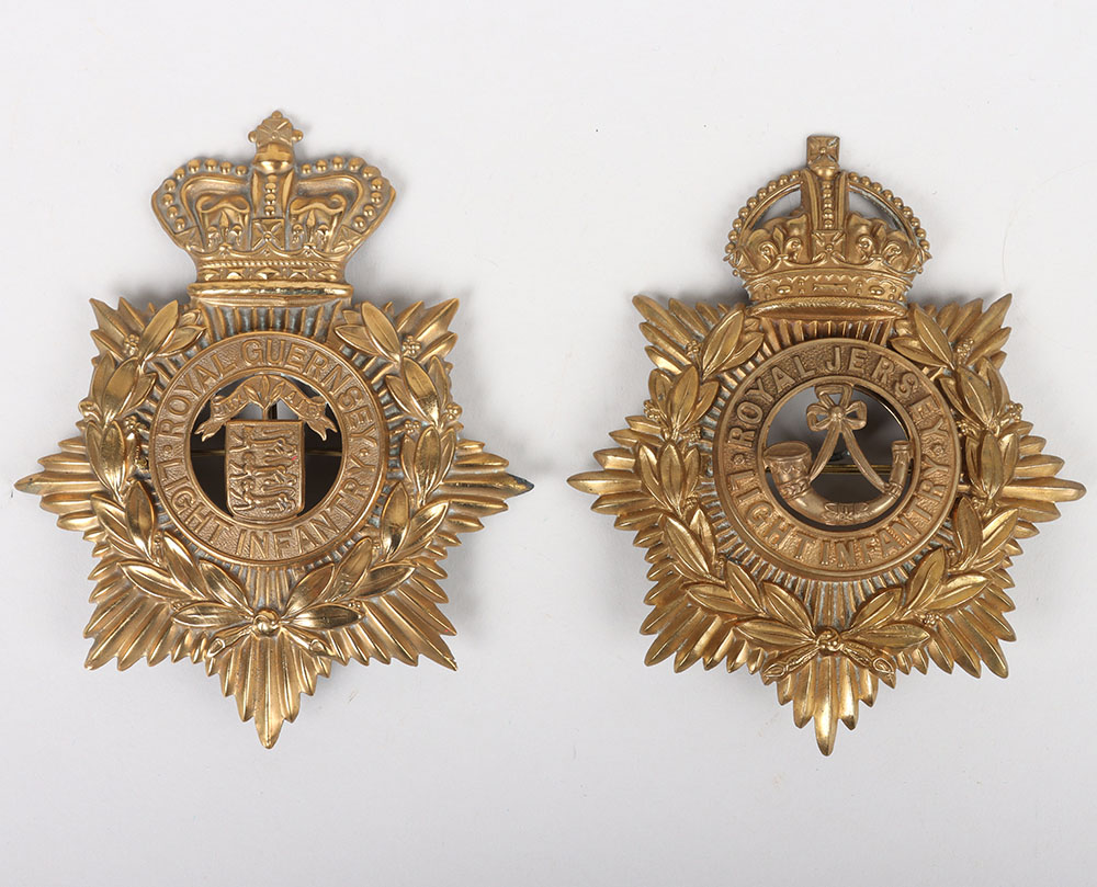 #211 – Channel Islands Royal Jersey and Royal Guernsey Light Infantry Other Ranks Helmet Plates