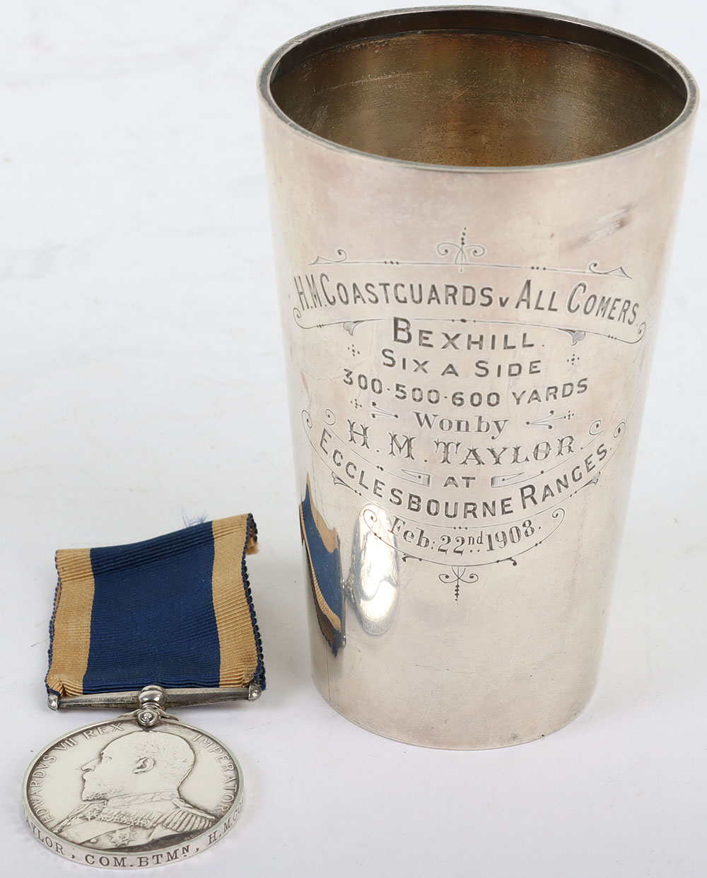 #77 – Edwardian Royal Navy Long Service Medal to the Coastguard Service with a Shooting Competition Trophy in the form of an Engraved Silver Beaker,