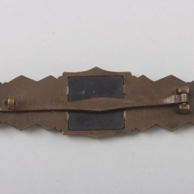 #79-1460 – Close Combat Clasp in Bronze – AGMUK